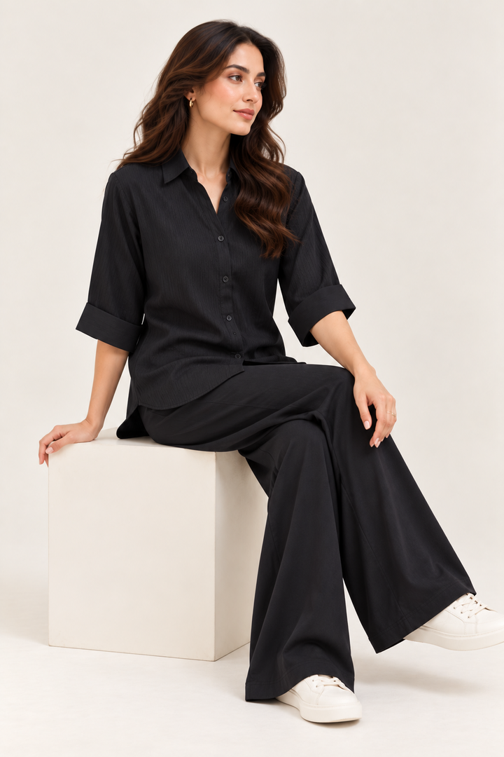 Black wrinkle crepe top sitting view