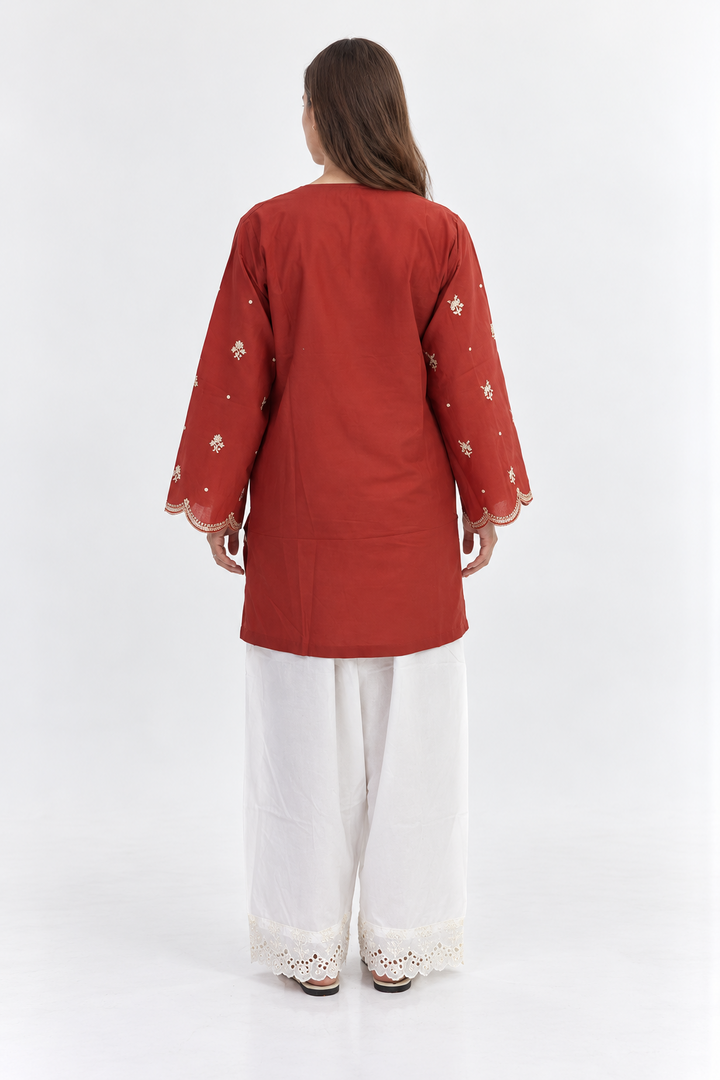 Embroidered Clay Ensemble sitting pose